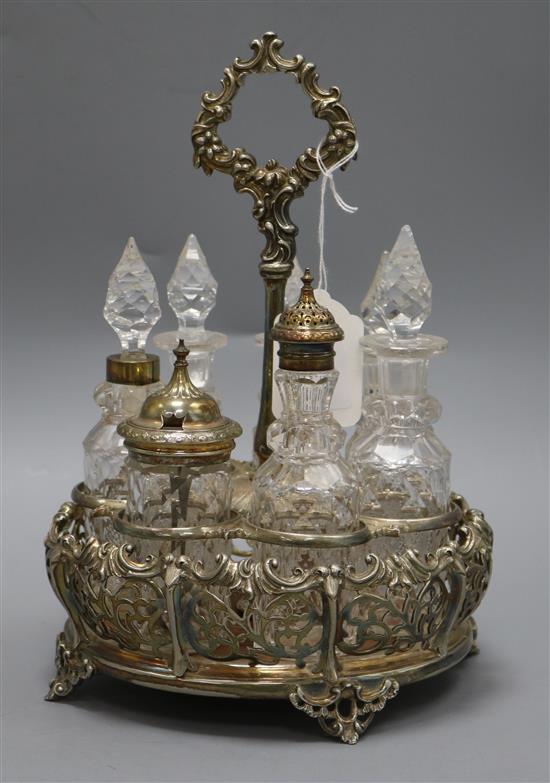 A silver plated seven bottle cruet